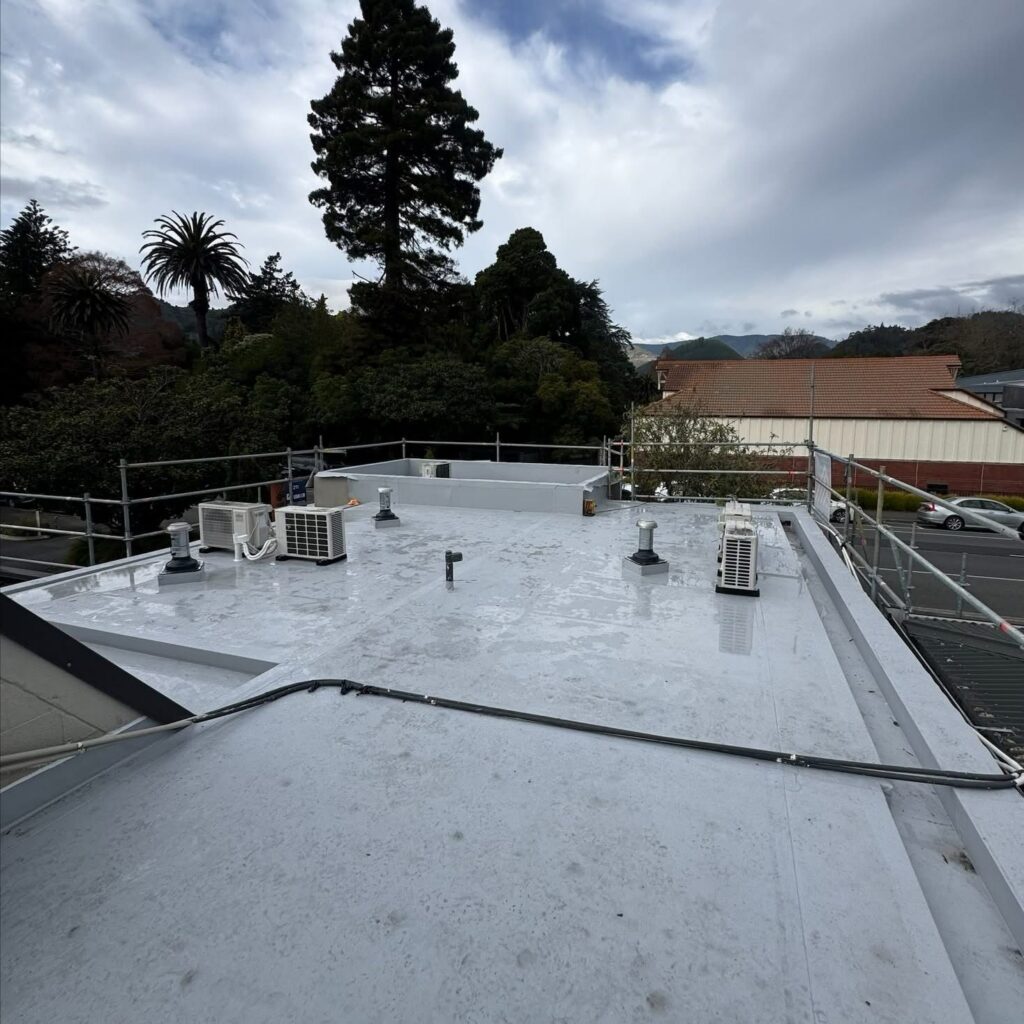 Completed insulated membrane recovery roof